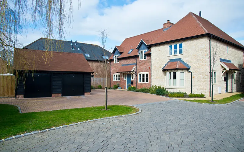 Clean block-paved driveway outside a house in South West London