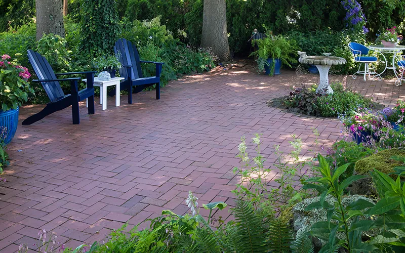 Freshly cleaned brick patio in a Wimbledon garden